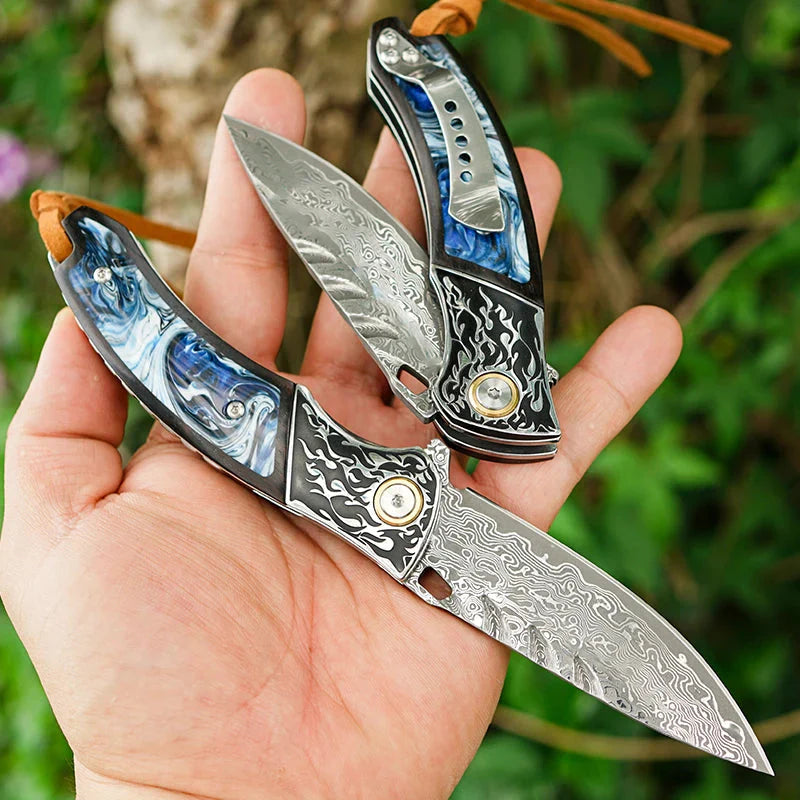 7" Handmade Damascus Pocket Knife with Pocket Clip - Resin & Ebony Wood - Flame Carved Steel Head Bolster